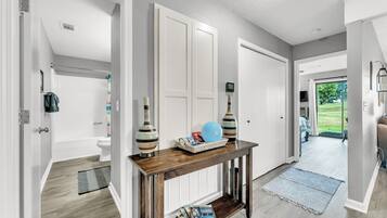 Combined shower/bathtub, hair dryer, towels, soap