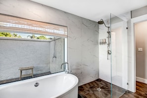 Bathtub, hair dryer, towels