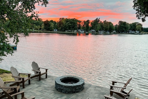 Nestled along the shoreline, this cozy spot invites you to unwind and connect with loved ones while enjoying the warmth and ambiance of a crackling fire.