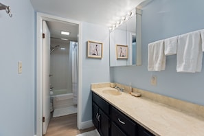 Bathtub, hair dryer, towels