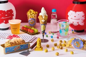 A variety of food items including popcorn, ice cream cones, and a drink.
