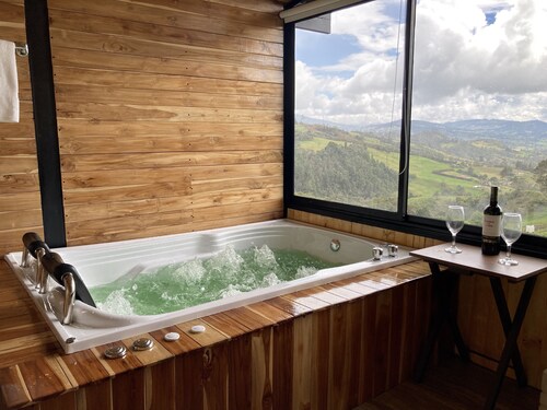 Cabin with private Jacuzzi in La Calera-Cundinamarca. Caneiros Cabin