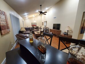 Smart TV, fireplace, books, stereo