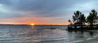 Small wooden house on the edge of a forest