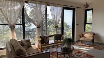 Pine Forest Suite | Living area | 32-inch LCD TV with cable channels