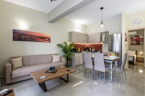 Appartement | Coin séjour | Télévision à écran plat de 42 pouces avec chaînes par câble, télévision