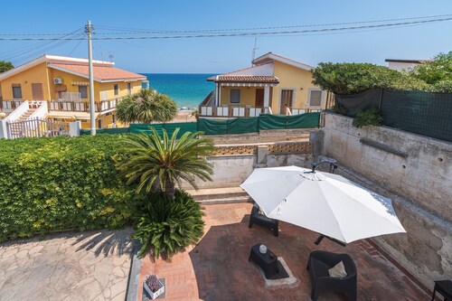 Maison de vacances "Villa Clara" avec vue sur la mer, terrasse couverte et jardin