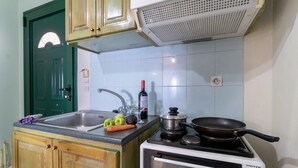 A kitchen with a sink, stove, and a microwave. - Holiday Apartment 'Apostolos Apartment 2' Close to Beach with Sea View (Lefkada)