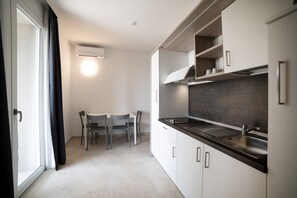 Fridge, stovetop, cookware/dishes/utensils