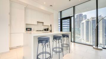 Exclusive Apartment, 2 Bedrooms | Private kitchen | Electric kettle, high chair, dining tables