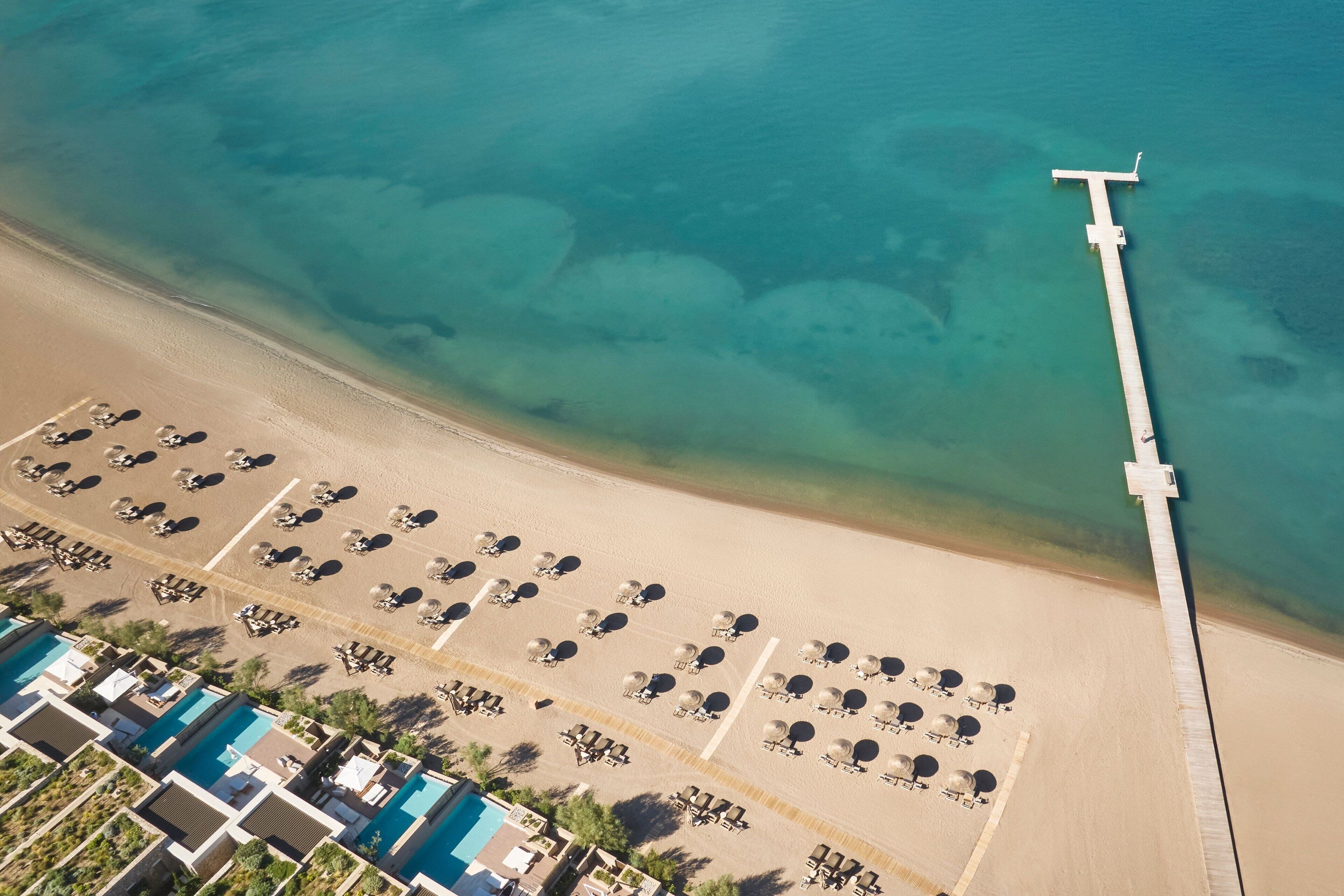 On the beach, sun loungers, beach umbrellas, beach towels