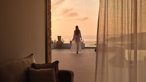 A room with a large window overlooking a balcony. - The Sall Suites Complex A - Sea Views (Zakynthos)