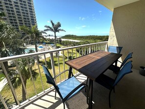 Outdoor dining - Pool and Beach views from this Beach Condo (Marco Island)