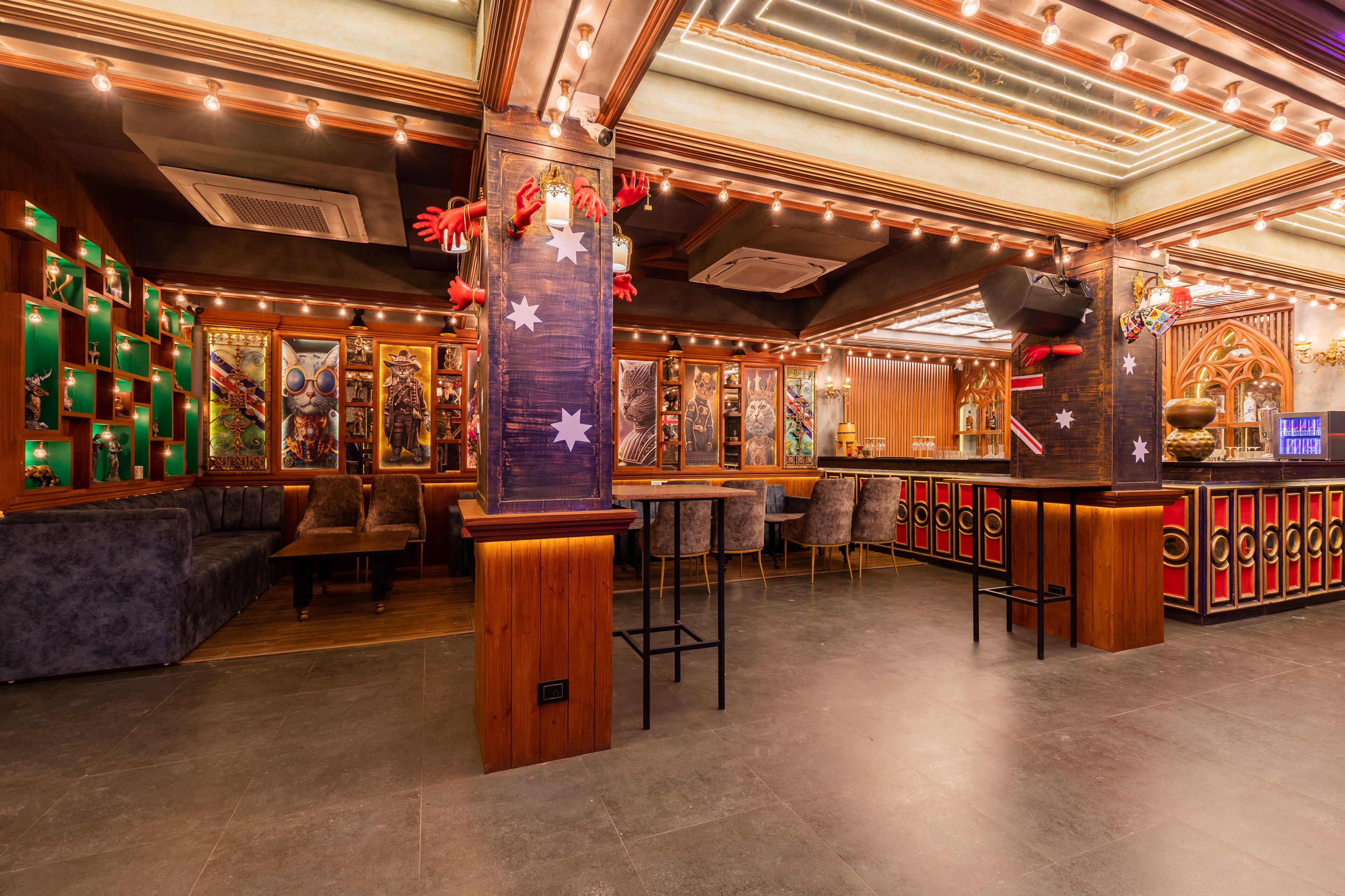A bar area with wooden accents, a bar counter, and seating.