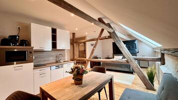 1,5 Zimmer Loft Bergblick & Marktblik | 起居区 | 平板电视