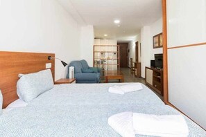 1 bedroom, desk, iron/ironing board, travel cot