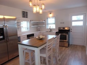 Cottage, 1 Bedroom | Private kitchen | Fridge, oven, stovetop, coffee/tea maker - Seachelle - Fully Renovated Luxury Beach Cottage! Pet Friendly! 1 Bedroom Cottage by Redawning (Kure Beach)