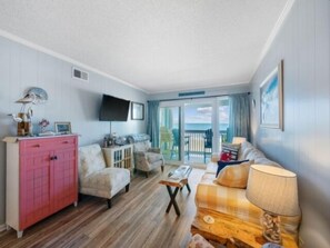 Living area - Vitamin Sea - Third Floor Oceanfront! Take A Break And Soak Up Some Vitamin Sea! 2 Bedroom Condo by RedAwning (Carolina Beach)