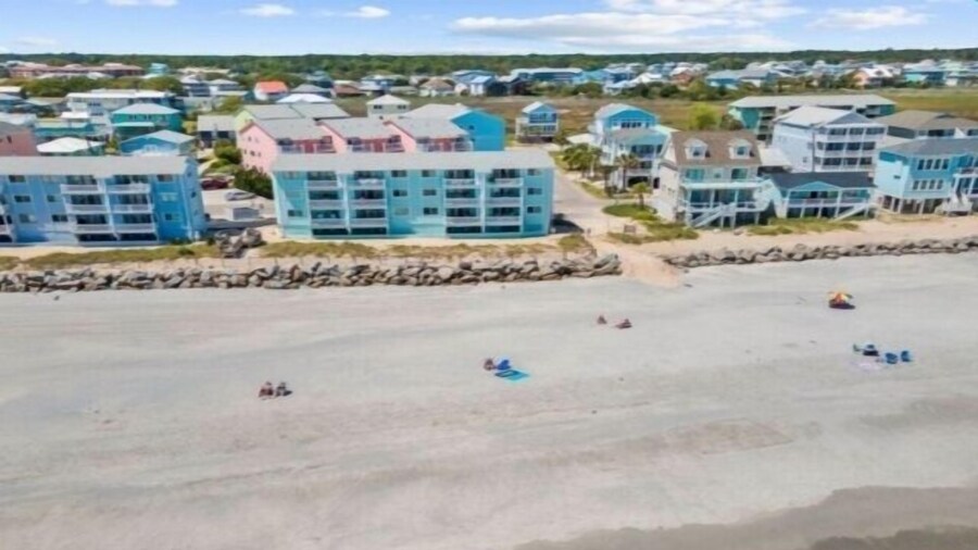 A18 Parrot Escape - Ocean View! There Is Nothing Quite Like A Carolina Sunrise Viewed From Your Private Oceanfront Deck 1 Bedroom Condo by RedAwning