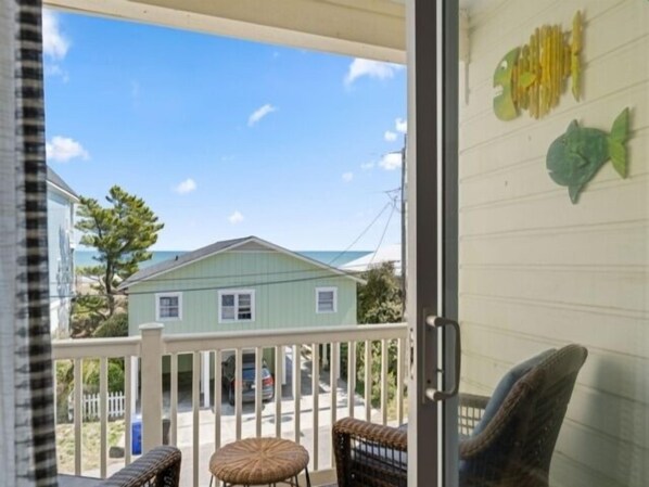 Condo, 1 Bedroom | Property grounds - Breezy Does It - Take It "br-eezy" While You Stay In The Heart Of Carolina Beach. One Minute Walk To The Beach! 1 Bedroom Condo by RedAwning (Carolina Beach)