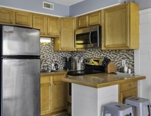 Condo, 1 Bedroom | Private kitchen | Fridge, oven, stovetop, dishwasher