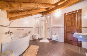 Bathtub, hair dryer, towels