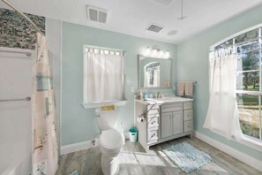Combined shower/tub, hair dryer, towels, soap