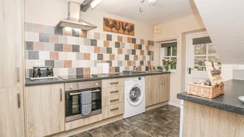 Fridge, electric kettle, toaster, cookware/dishes/utensils