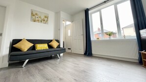 Hus | Oppholdsrom | En 30-tommers TV med Parabol-TV