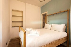 Departamento básico, 2 camas matrimoniales | 2 habitaciones, tabla de planchar con plancha y wifi gratis 