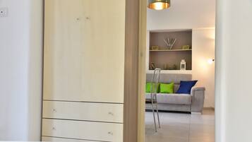 Design Suite, 1 Bedroom, City View | Living area | Flat-screen TV