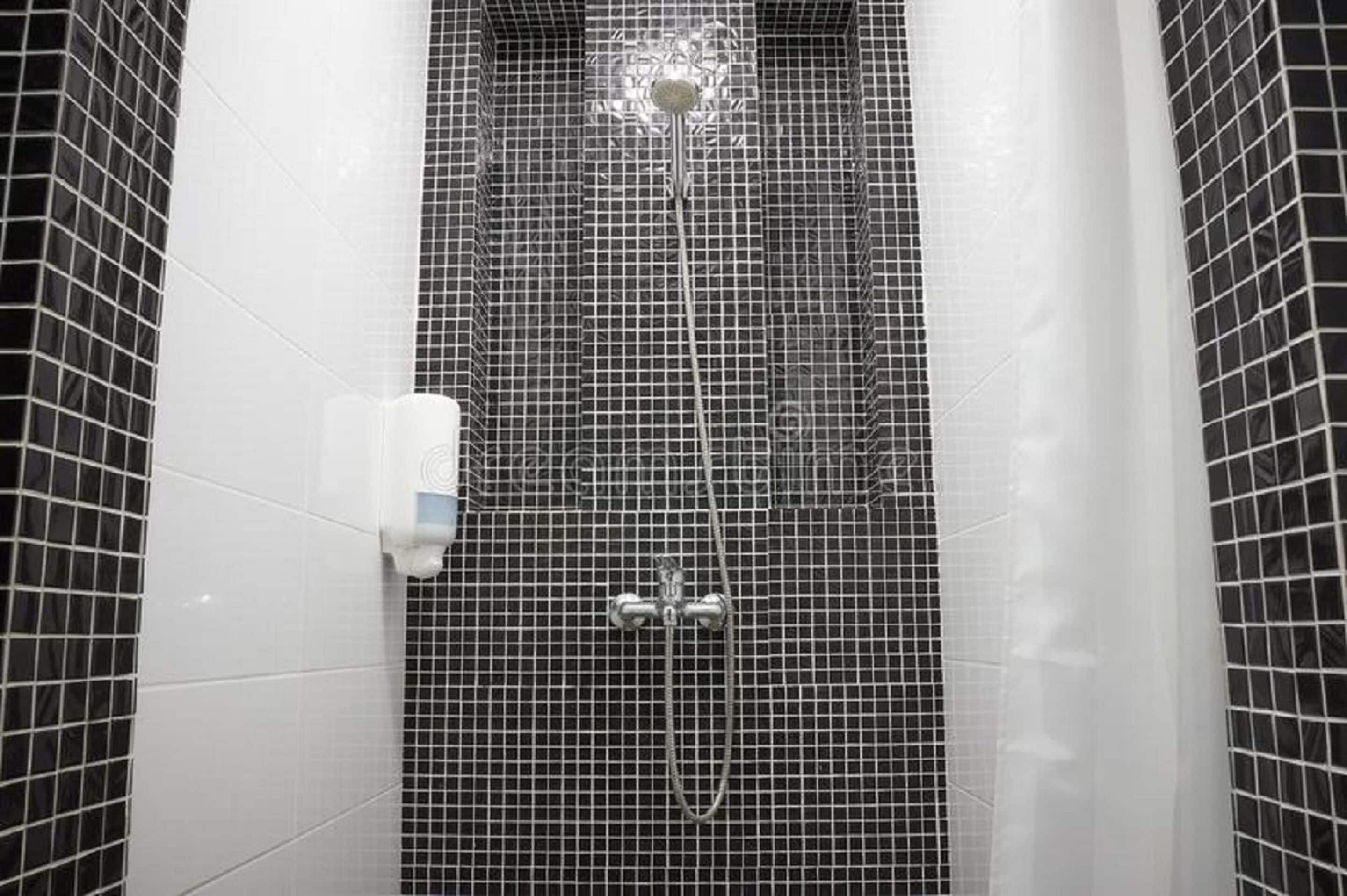 shower, rainfall showerhead, hair dryer, towels
