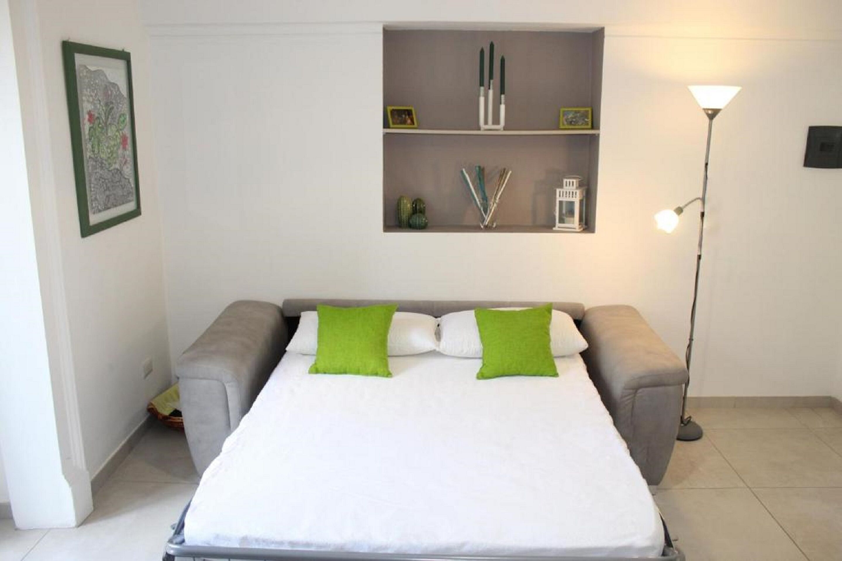 design suite, 1 bedroom, city view | living area | flat-screen tv