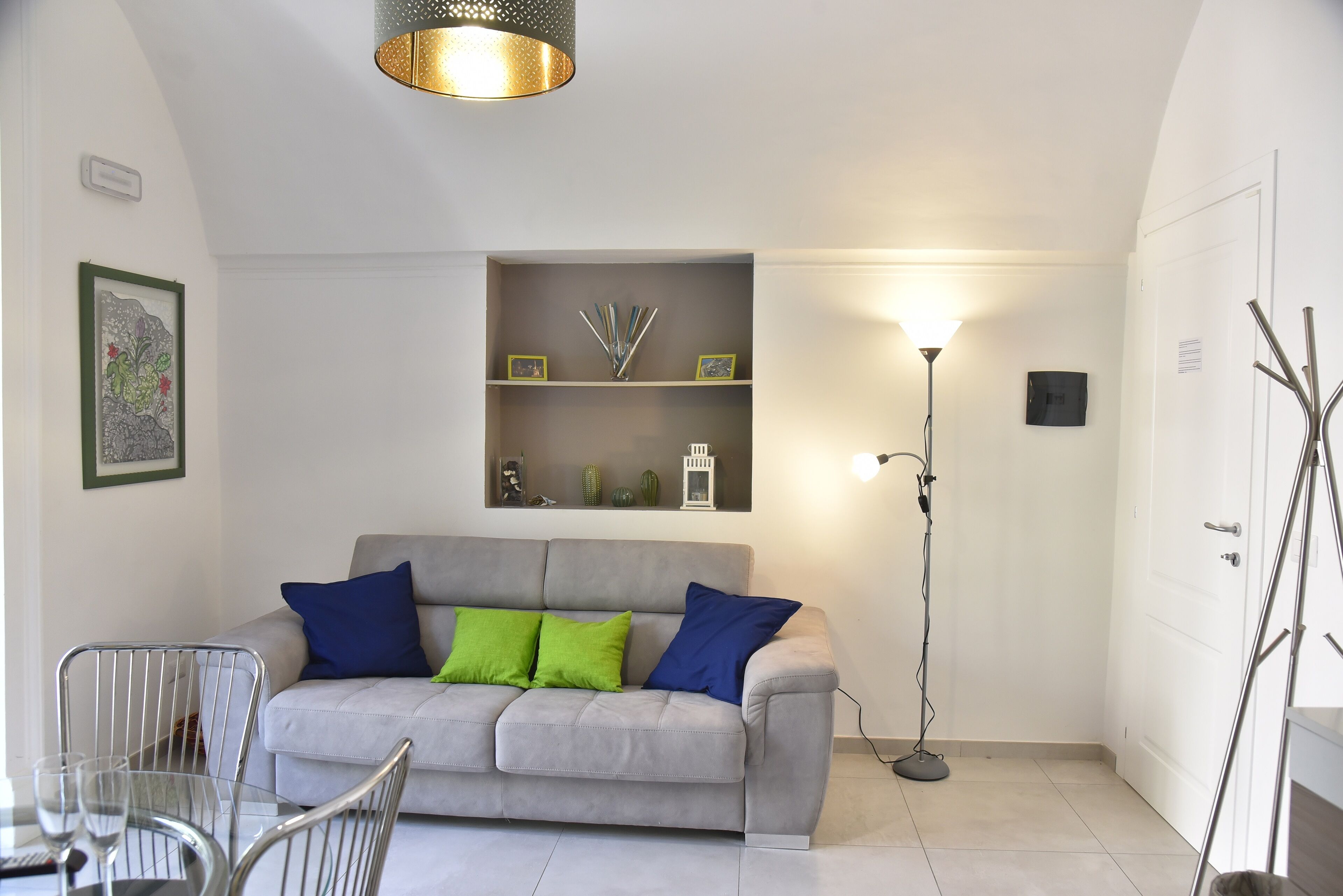 design suite, 1 bedroom, city view | living area | flat-screen tv