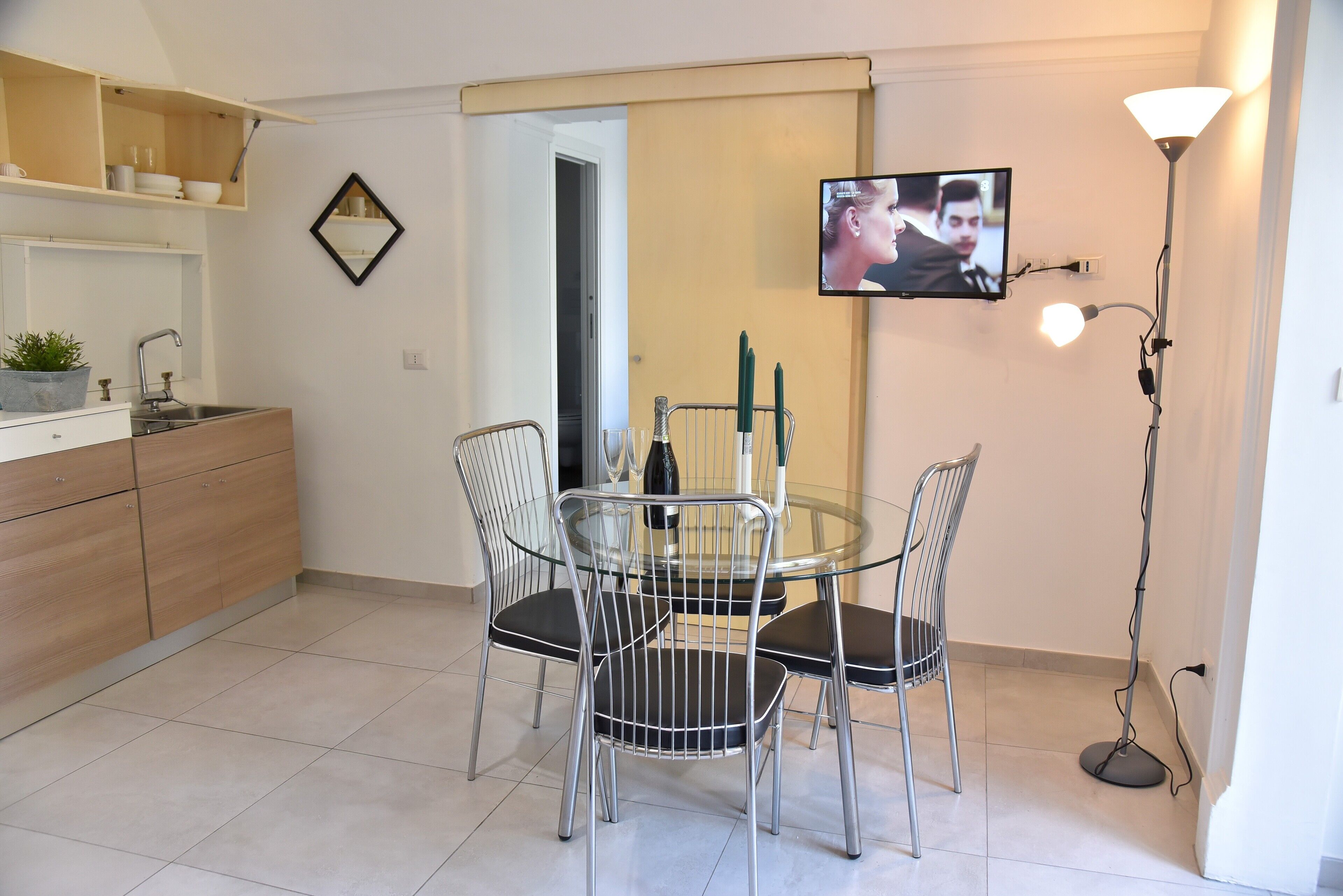 design suite, 1 bedroom, city view | living area | flat-screen tv