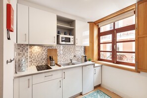 Fridge, microwave, coffee/tea maker, electric kettle