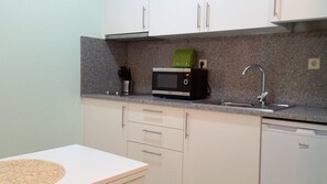 Fridge, microwave, coffee/tea maker, electric kettle