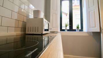 Fridge, microwave, coffee/tea maker, electric kettle