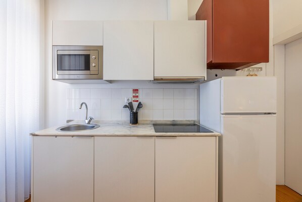 Fridge, microwave, electric kettle, toaster