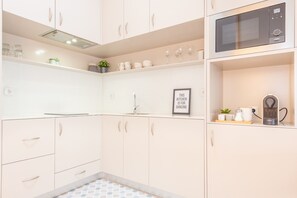 Fridge, microwave, coffee/tea maker, electric kettle