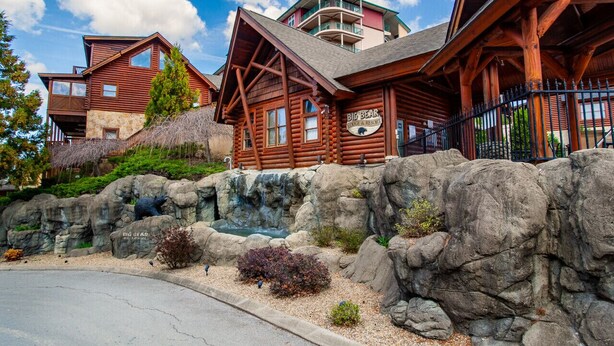 A log cabin-style building with a sign reading "Big Bear Lodge & Resort". - The Bear Paw Palace - Mtn View & Community Pools! (Pigeon Forge)