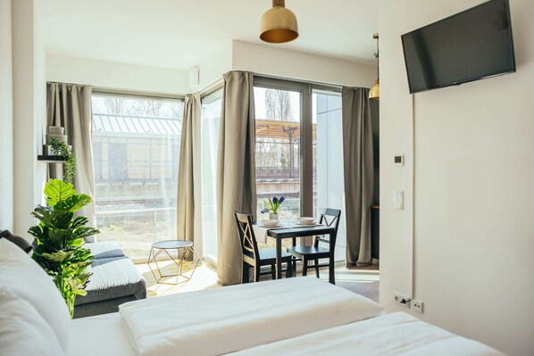 1 dormitorio, tabla de planchar con plancha, wifi y ropa de cama