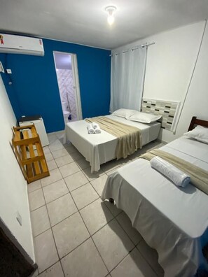 Economy Triple Room, Terrace | Blackout drapes, free WiFi, bed sheets - Pousada Iapôi (Ipojuca)