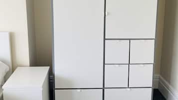 Premium bedding, desk, laptop workspace, soundproofing