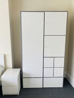 Premium bedding, desk, laptop workspace, soundproofing