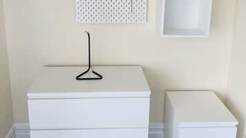 Premium bedding, desk, laptop workspace, soundproofing