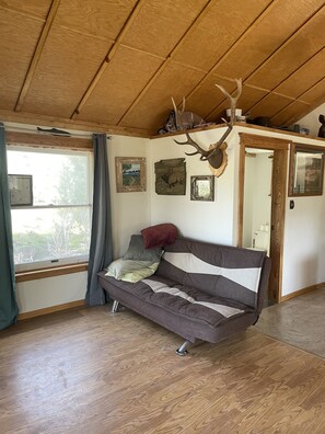 Living area - Mountain Cabin w/ great views and fire pit.  Located 5 mins to outdoor adventure (Mesa)