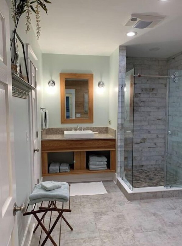 Combined shower/tub, hair dryer, towels, soap