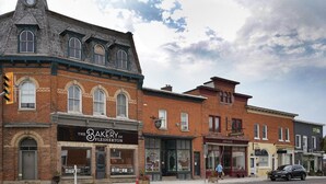 A street view with buildings including 'The Bakery of Flesherton' and 'The Gate Restaurant'. - Lake Eugenia Autumn Escape - Private Dock, Hot tub and Firepit (Flesherton)