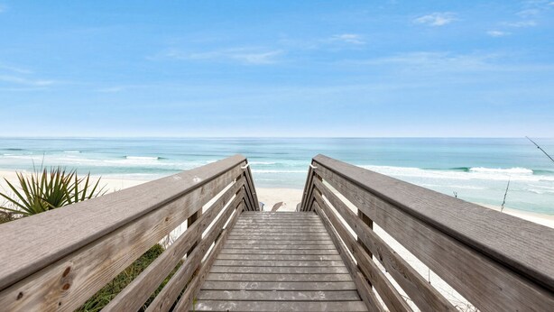 A wooden boardwalk leading to a beach with clear skies. - Posh Home + Private Pool, LSV, Putt & Basketball (Seacrest)